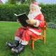 Weihnachtsmann sitzend groß Buch...